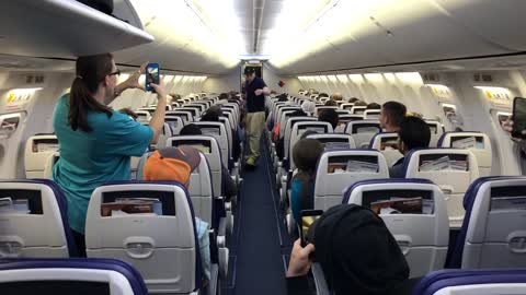 Guy Skateboards to his seat on Southwest flight!