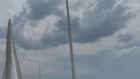 The bridge under the white clouds