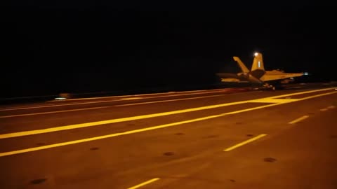 Night flights from the nuclear aircraft carrier CVN 76 Ronald Reagan in the Philippine Sea