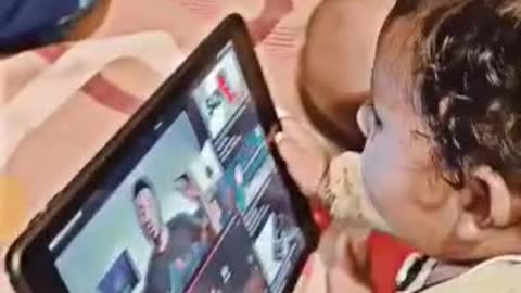 Cute baby watching iPad