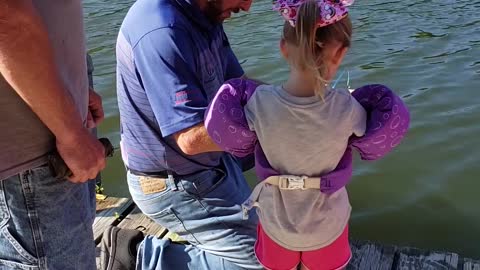 Little Girl Reels in Monster Fish with Mini Pole