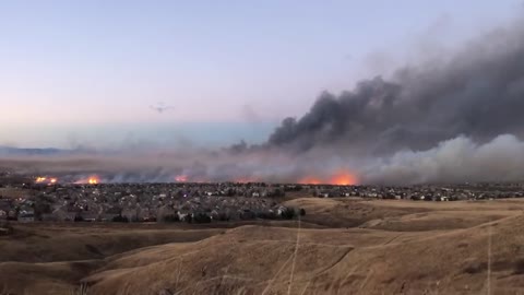 Fire still burning homes near sunset in Superior Colorado
