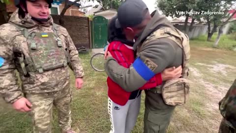 Moment mother reunites with son in retaken Ukraine town