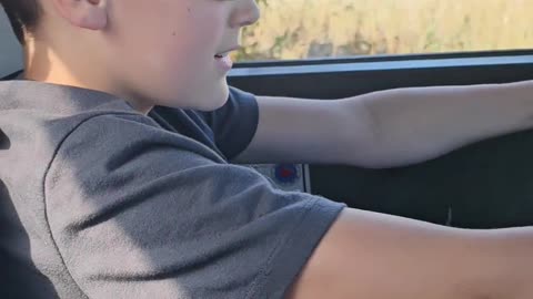 Boy driving the m925a1 6x6