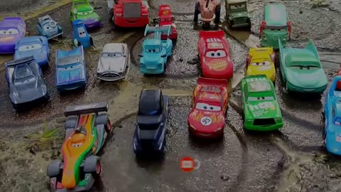 Disney Pixar Cars fall into the water: Lightning McQueen, Mack Trucks, Sally Carrera, Dinoco, Mater