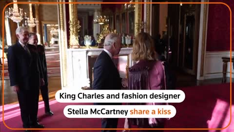 Stella McCartney greets King Charles with a kiss