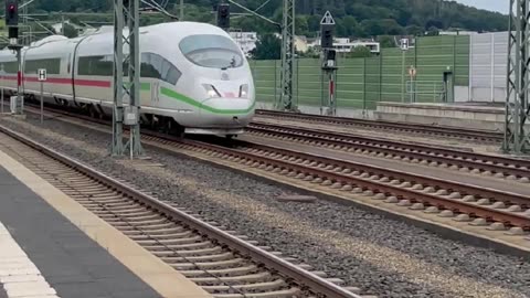 Intercity Express 3 ( ICE 3 ) passage at 300 km/h (186 MPH ) in Montabaur