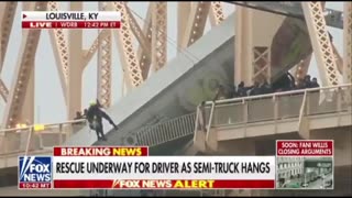 Dramatic Rescue Efforts can be seen as Semi-Truck Dangles Off the Bridge Connecting KY and IN