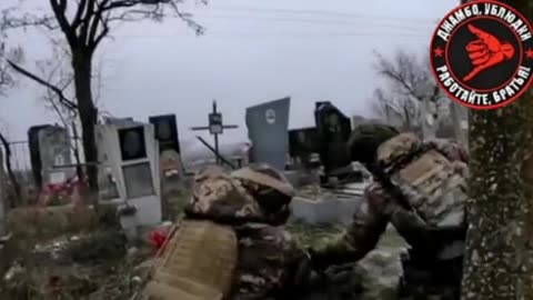 Bakhmut UAF militants fire from the cemetery