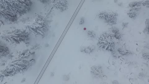 Outdoor aerial photography, snowy winter morning in a rural American town