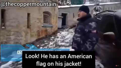 Ukraine: man with American flag patch with SBU