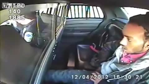 This Criminal Pulls Gun In The Back Seat of Police Car!