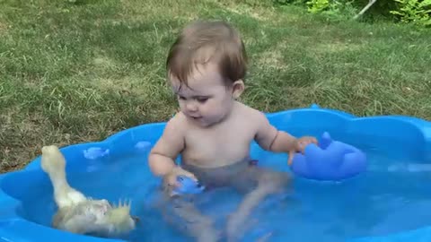 Funny Baby Reaction to Duckling
