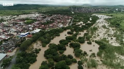 Dams burst in Brazil as deadly flooding continues - BBC News