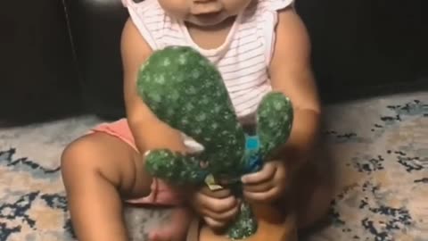 baby funny crying because of dancing cactus toy