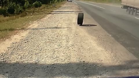 FRONT TIRE goes Flying Off Truck, hits Parked Car