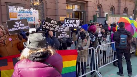 Protesters and counter-protesters gather outside a Drag Queen Story Hour event in Manhattan.