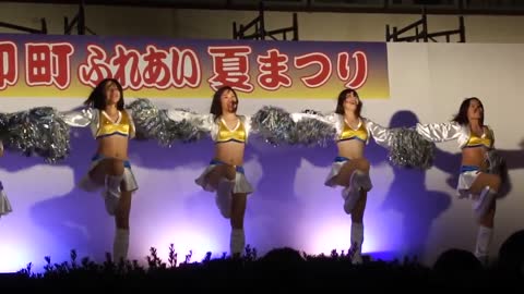 Sexy Japanese cheerleaders at summer festival.