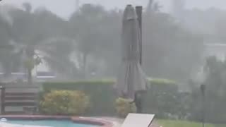 Miami Beach, Florida, intense storm with wild rain and strong gusts of wind.