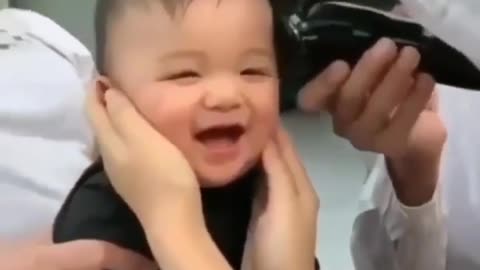 cutest baby in the world cutting hair