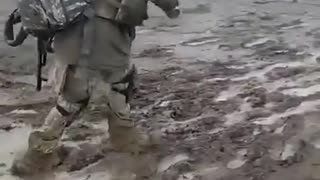 Muddy Ukrainian soldiers Donbas Ukraine March 2023