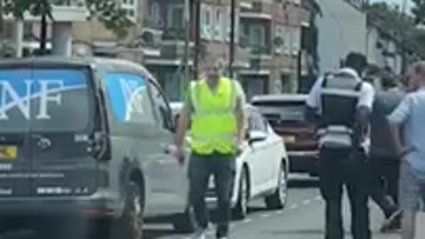 Shocking Moment: Angry Driver Attacks Traffic Warden Pole