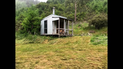 Remote Cabin built after clearing an area with a Komatsu D21A bulldozer - from start to finish.