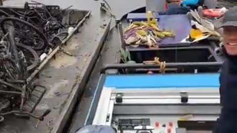 Cleaning the canals of Amsterdam