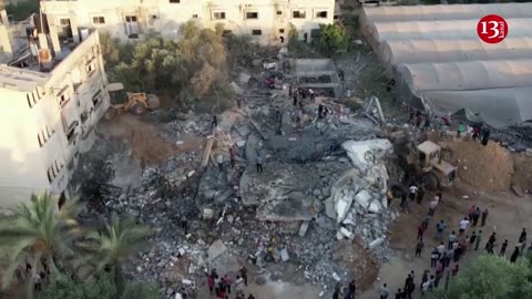 Israel vs gaza Drone footage shows excavators removing rubble in Gaza neighbourhood