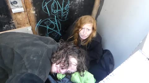 Homeless Junkies Get Confronted Behind Cardboard Box