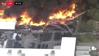 Massive 5 acre fire has broken out a warehouse storing plastic plant pots