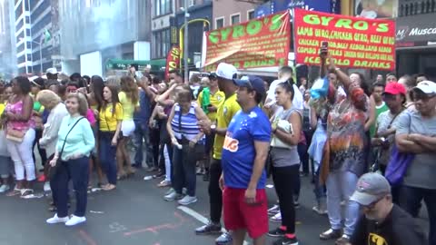 BRAZILIAN GIRL DANCES A BRAZILIAN SAMBA STREET DANCE AT BRAZILIAN CARNIVAL CULTURE PARTY NEW YORK