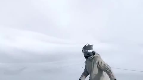 Athlete Shows Fun Tricks While Snowboarding Downhill