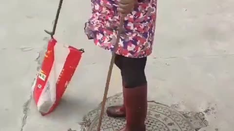 [CHINA[ Woman Caught RED-HANDED Fishing SEWAGE For Oil