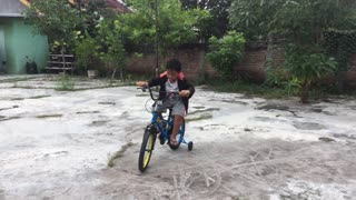 Nevan learns to ride a new bike