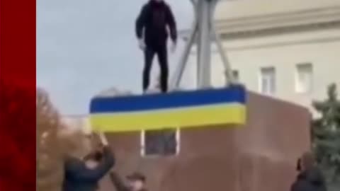 Ukrainian flags fly in Kherson after Russians retreat from the key southern city.