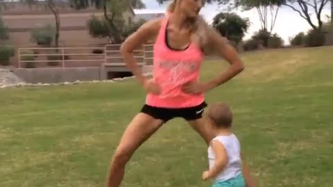 "Little Girl Copies Mom Workout"