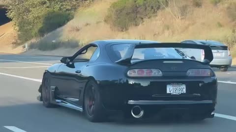 Supra MK4 black beast on Highway