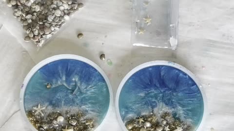 Beach Coasters With Seashells and Starfish Made Using Epoxy Resin