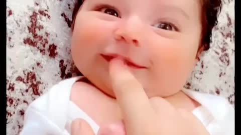 My baby laughs for the first time after being born 2 weeks ago