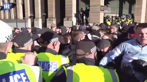 'Who hit me': Moment protestors clash with police in Parliament Square on Armistice Day