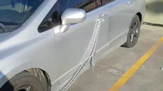 Car Secured With Lock and Chain