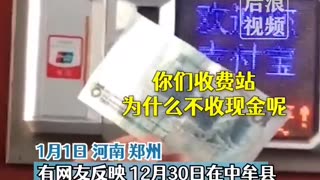 Chinese government employee at the toll booth refused to accept cash as toll payment.