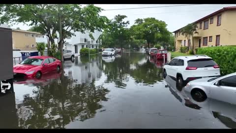 Drone shots of entire Miami, Fl neighborhood flooded, businesses flooded, 6-4-2022