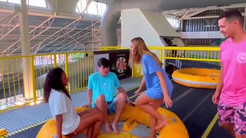 Sliding down America's first rotating water slide!MTw