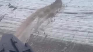 A river-like fountain flow piercing through a glacier