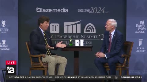 Tucker calls out Governor Asa Hutchinson over supporting surgeries for transgender youth