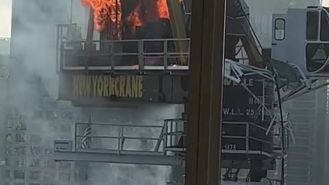 Crane arm catches fire, collapses onto New York City — Footage captured from a very close angle