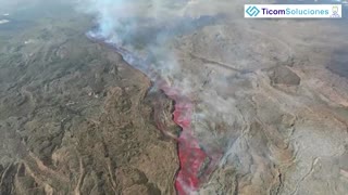 Drone footage shows lava stream hit La Palma beach