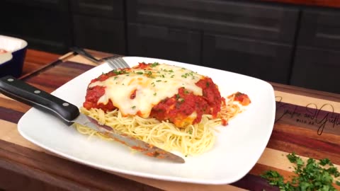 Check out this easy and delicious Chicken Parmesan